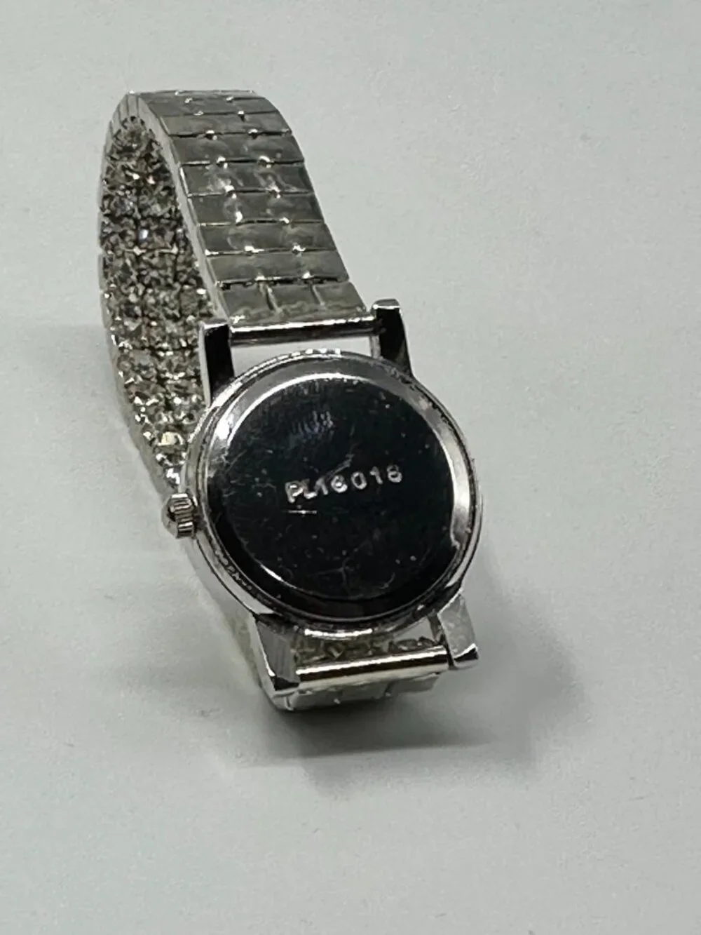 Rhinestone Watch Women Silver Tone Mother of Pearl Dial Stretch New Battery 6.5